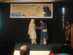Ms Rohi Syed Presenting Souvenir to Ms Anosha Rehman